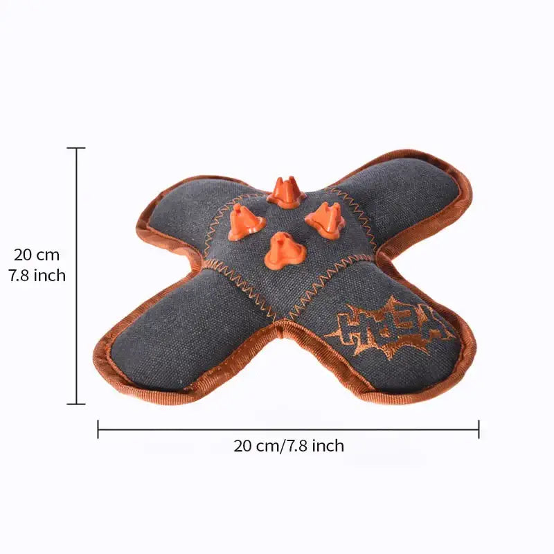 Close-up of rubber texture on squeaky dental chew toy for dogs